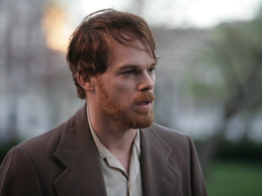 Carr's formidable charisma becomes something of a problem when David (Michael C. Hall), his former lover and professor, won't let go.