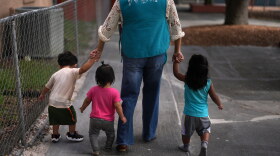 A teacher escorts young children back to their classroom at a Head Start preschool in Immokalee, Fla., Thursday, Sept. 10, 2026.