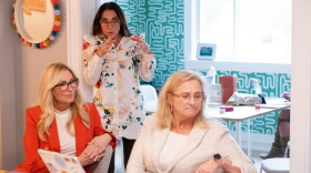 Kim Bode (center) presenting to a group of women business owners in the Women's Entrepreneurial Fellowship at the 834 Learning Hub.