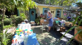 Jimari Hallam takes inventory of neighborhood donations ahead of traveling to South Pine Island. It was her second trip to hand-deliver food and supplies to Hurricane Ian survivors.