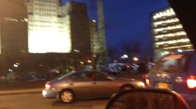 A few hundred activists marched into Niagara Square Friday night for education rally