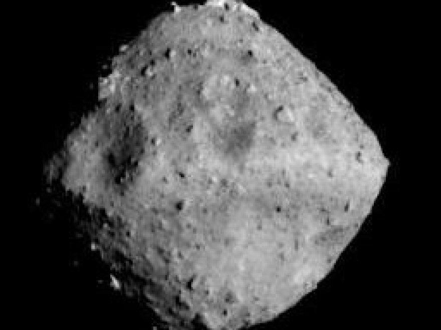Asteroid Ryugu, photographed on June 26 by the Hayabusa2 spacecraft, was the Japanese mission's destination. The craft will travel alongside the asteroid for 18 months.