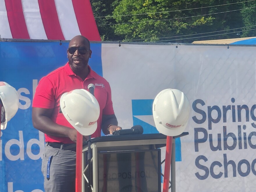 Pershing Middle School Principal Tommy Wells speaks at the groundbreaking for a new Pershing building in Springfield, Mo. on July 9, 2026.