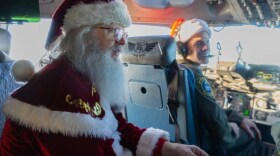 Santa catches a ride on a Blackhawk.