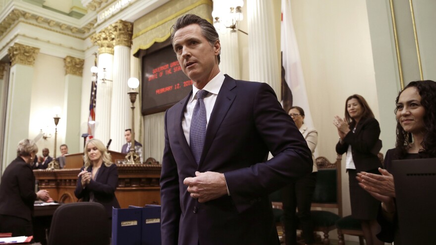 Calif. Gov. Gavin Newsom receives applause after delivering his first State of the State address. In that address he said he planned to scale back California's high-speed rail project and focus immediately on building 171 miles of track in central California.