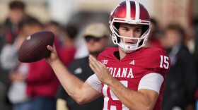 Indiana quarterback Fernando Mendoza throws before an NCAA college football game against Wisconsin, Saturday, Nov. 15, 2025, in Bloomington, Ind.