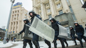 Authorities respond to protesters at Independence Square in December 2013 in Kiev, Ukraine. Mass protest actions started after the president of Ukraine Victor Yanukovych refused the association agreement with the European Union.