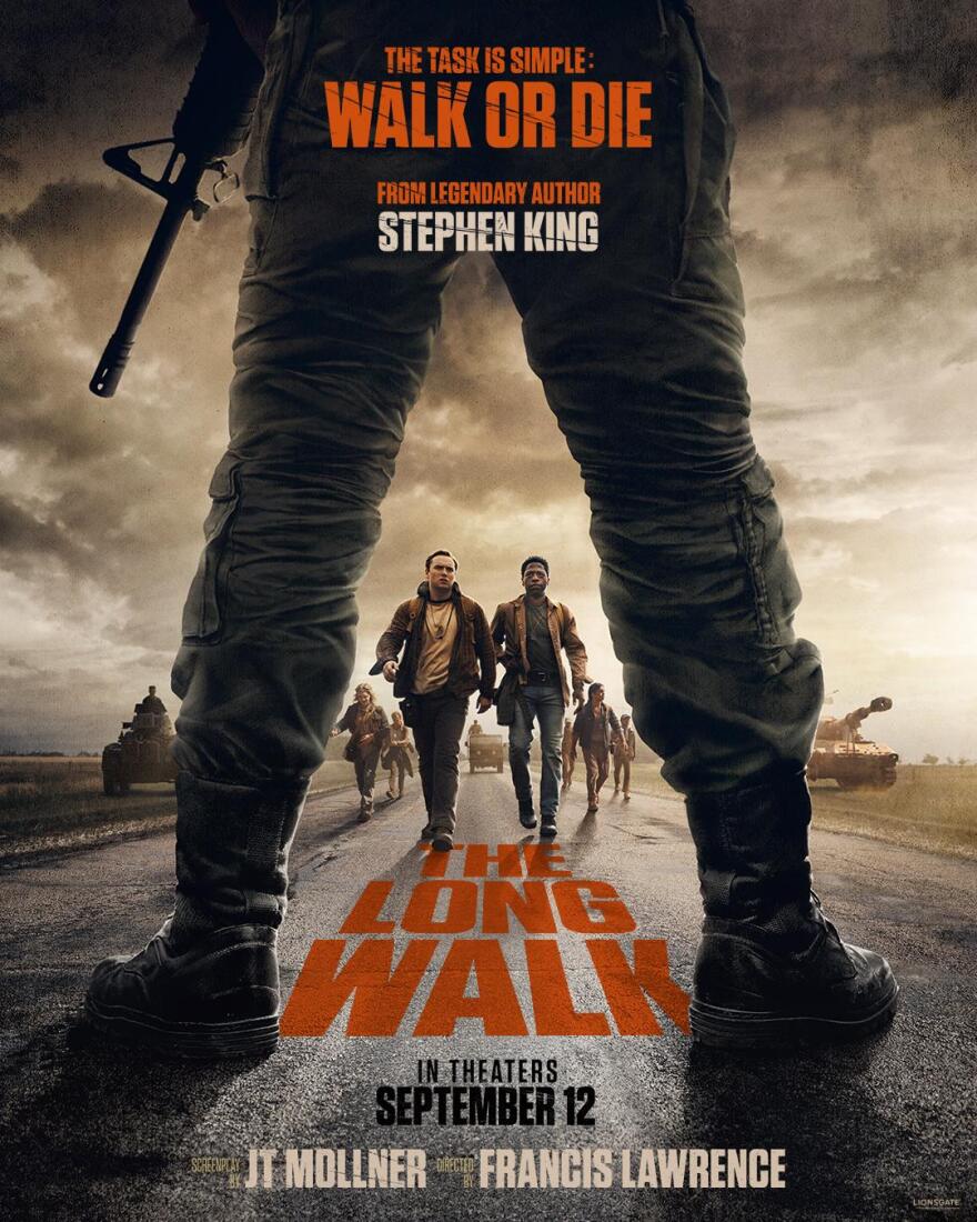 A movie poster shows several people walking up to a giant person's legs. The scene looks like it could be post-apocalyptic. 