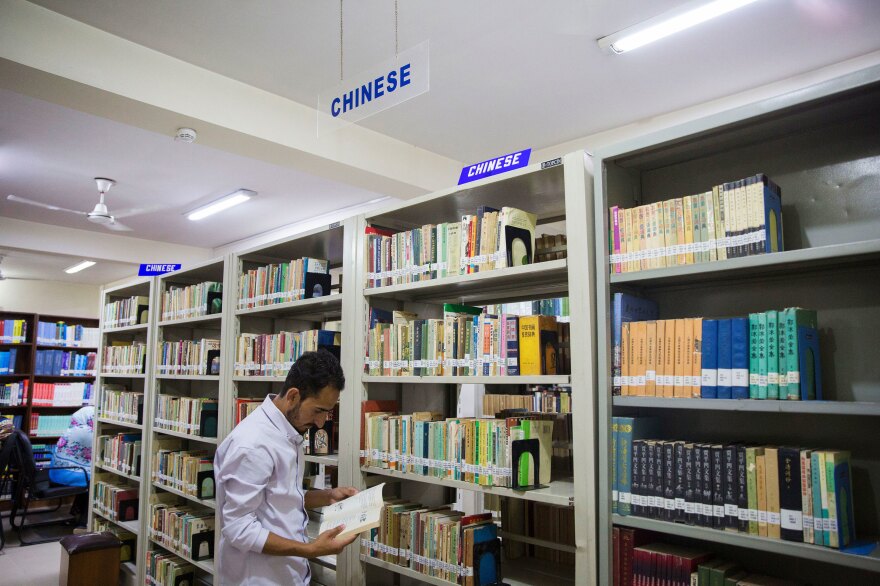 Abbas looks at books in the library at the National University of Modern Languages. Much of the rush to learn Mandarin began after Beijing and Islamabad signed a memorandum of understanding that launched the China-Pakistan Economic Corridor in 2015.