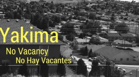 Black and white photo of a Yakima neighborhood with text saying no vacancy