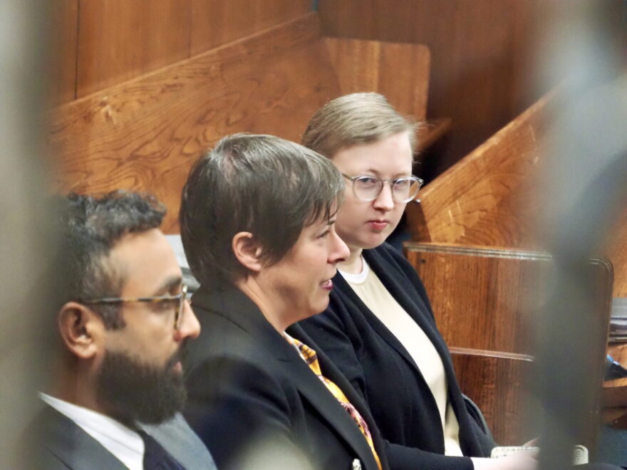 Former Norman High School teacher Summer Boismier, far right, sits next to her attorneys, Iris Halpern, center, and Neil Sandhu, left, before a hearing in Oklahoma County District Court on Wednesday in Oklahoma City.