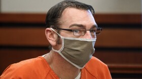 FILE -James Crumbley, father of Ethan Crumbley, a teenager accused of killing four students in a shooting at Oxford High School, appears in court for a preliminary examination on involuntary manslaughter charges in Rochester Hills, Mich., Tuesday, Feb. 8, 2022. James Crumbley, the father of a Michigan school shooter wants jurors from a different county to decide his involuntary manslaughter case, arguing that he can't get a fair trial because of excessive publicity and his wife's recent conviction. (AP Photo/Paul Sancya, File)