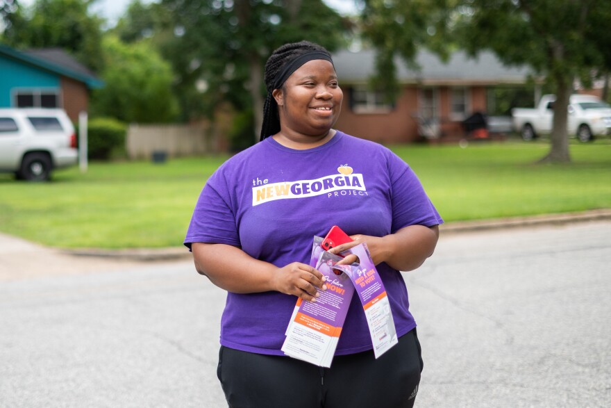 Shayla Jackson, an organizer with the New Georgia Project, canvasses on Aug. 29, 2022.