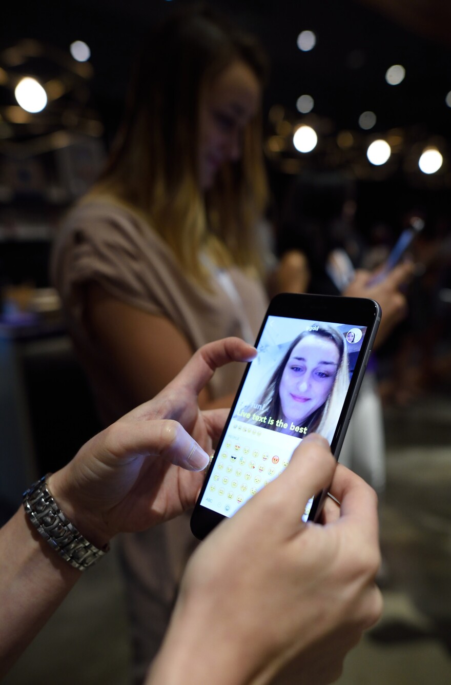 Yahoo's new Livetext app shows videos of users while they type.