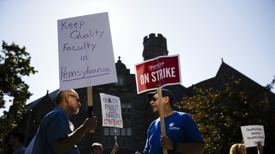 Faculty members picket at West Chester University in Pennsylvania where faculty at state universities went on strike Wednesday morning.