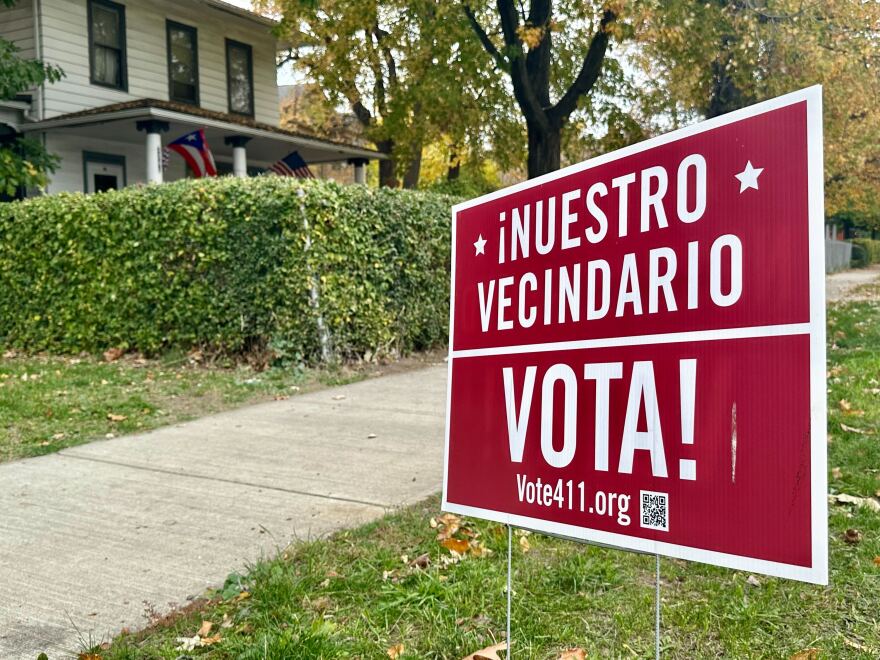 A red election sign in Cleveland's Clark-Fulton neighborhood says "Nuestro vecindario vota."