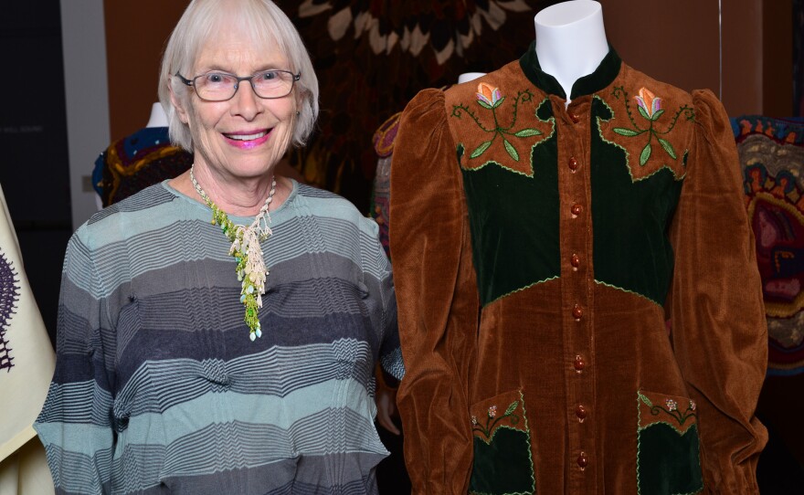 Elizabeth Mitchell next to her velvet granny dress. From 1968 to 1974, Mitchell lived in Mendocino, Calif., where she ran a small boutique called The Midnight Sewing Machine. Mitchell is one of dozens of people who lent their personal garments to BAM.