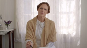 Emily (Molly Shannon) thinking at her desk, in a still from "Wild Nights With Emily." (Courtesy of Greenwich Entertainment)