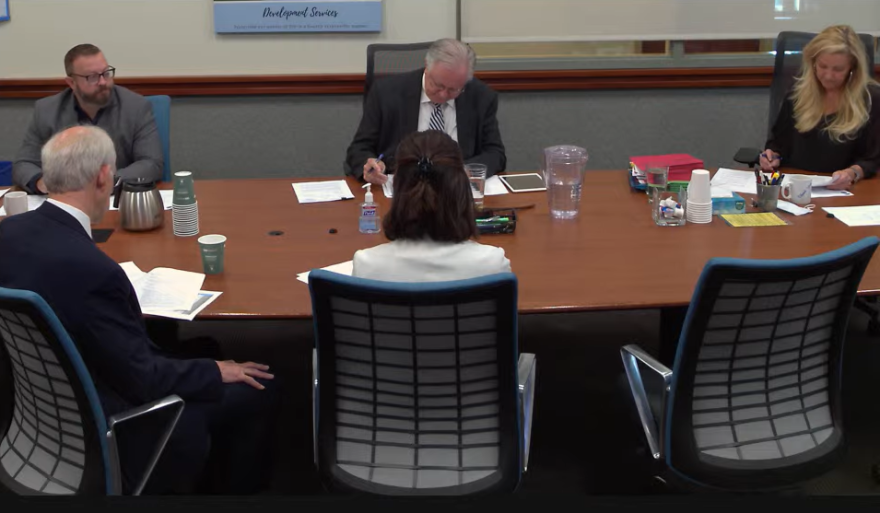 Ada County commissioners (facing camera, left to right) Ryan Davidson, Rod Beck and Kendra Kenyon at an August meeting in their chambers at the county courthouse. (Screenshot from Ada County’s YouTube page)