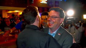 James Mueller hugs a supporter at Corby's Irish Pub after winning the South Bend mayoral election