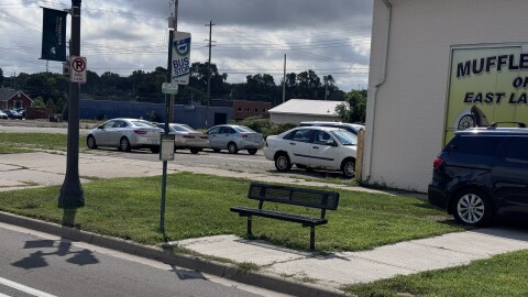 Bus stop with a bench.