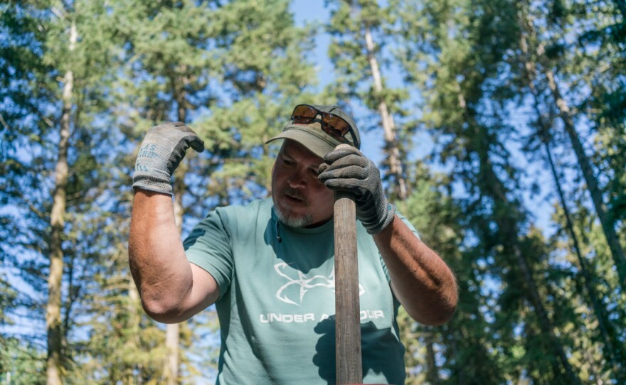 Stacy Courville checks his arm for splatter from the "bait bucket."