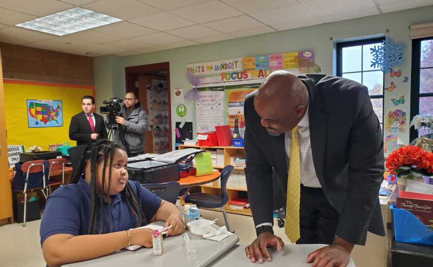Springfield fifth grader Kennedy Kerr speaks with Massachusetts Secretary of Education Patrick Tutwiler about the "Breakfast in the Classroom" model, which is succeeding in Springfield. A new report shows 87% of students are eating in the morning.