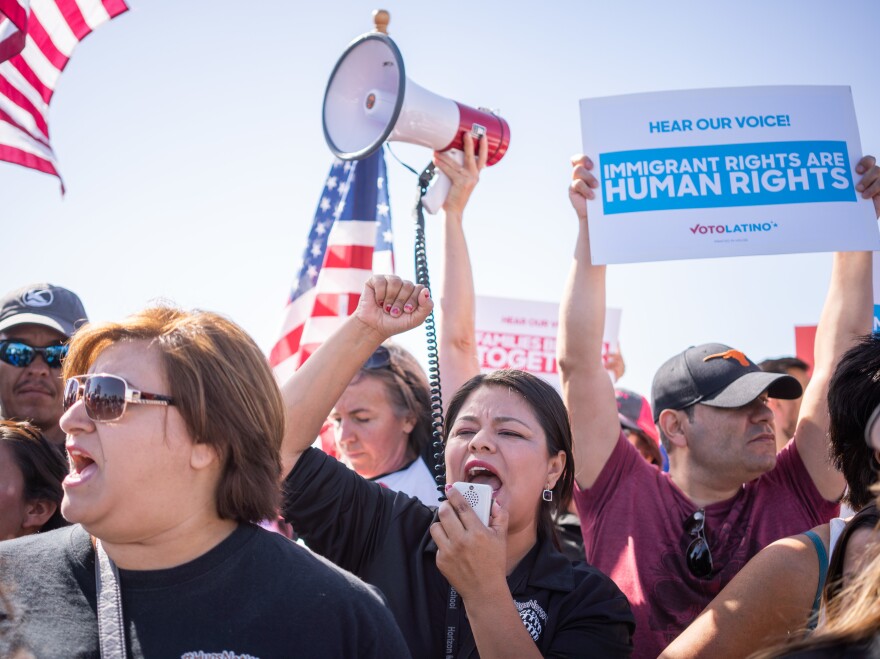 Activists chant at an "End Family Detention," event at the Tornillo Port of Entry on Sunday.