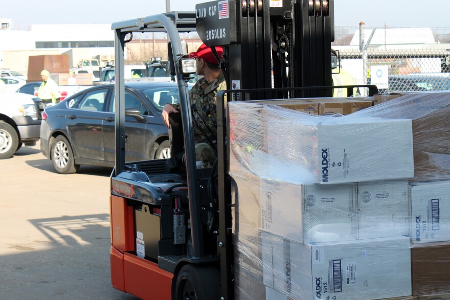 The National Guard organizes deliveries of personal protective equipment to hospitals on March 26.