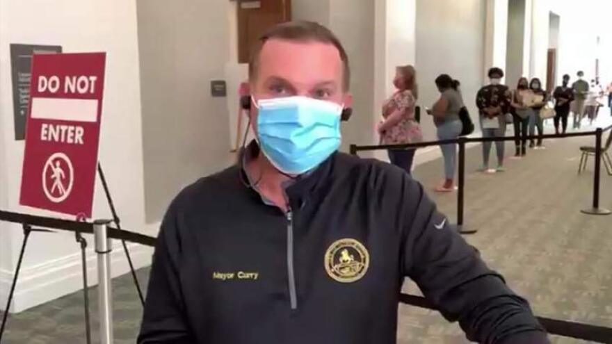 Mayor Lenny Curry is pictured wearing a mask recently at the Main Library branch in Downtown Jacksonville.