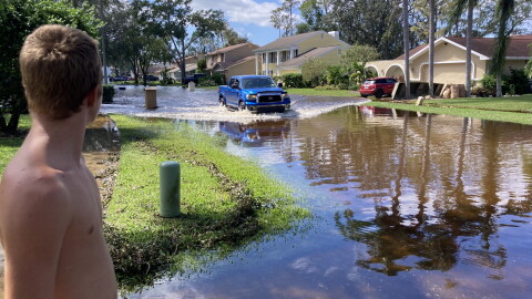 Flooding from overloaded storm sewers in northern Hillsborough County from Hurricane Milton in October 2024.