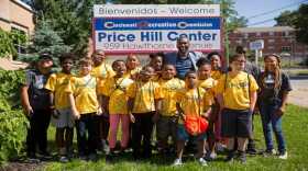 Daniel Betts, the recreation department director, makes a surprise visit to the Price Hill Recreation Center before their field trip to the zoo.