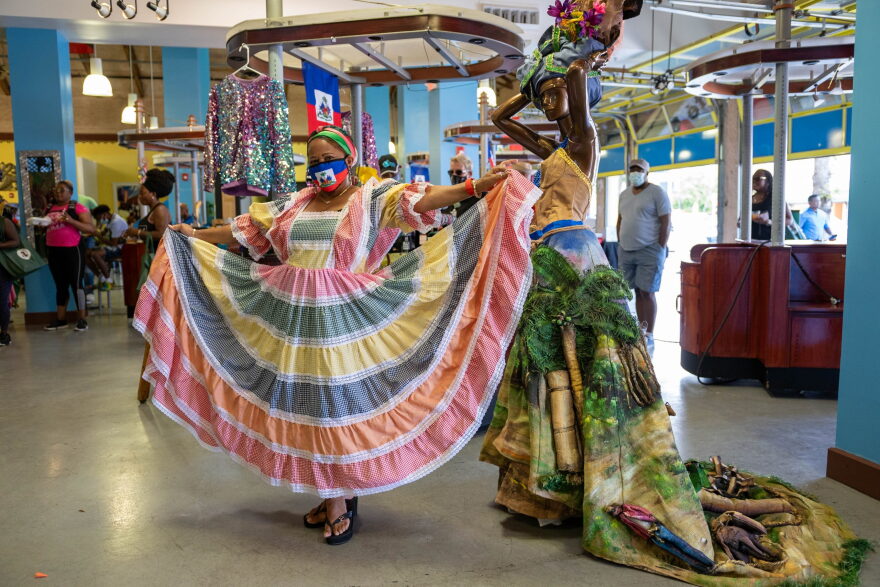  A Haitian-American woman models a traditional Haitian dress and headwear at last year's Haitian Heritage Month celebration at the Little Haiti Cultural Complex in Miami.