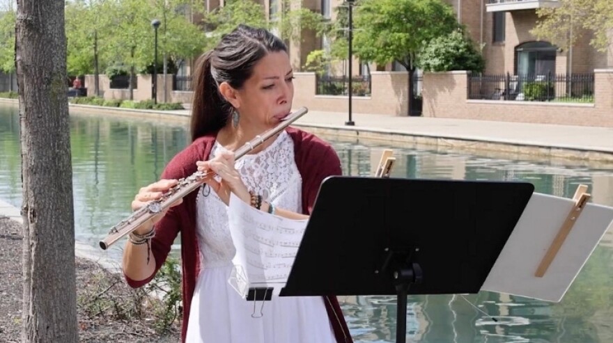 Laura Recendez performs on the Indianapolis canal walk as part of Classical Music Indy’s CMI City Sounds series.