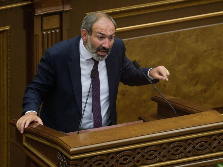 Nikol Pashinyan, the only candidate for prime minister, answers lawmakers' questions at the extraordinary session of parliament Tuesday. Lawmakers later rejected him, leaving the post vacant.