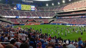 Buffalo Bills players stretch on the field prior to the start of the team's 'Return of the Blue and Red' practice inside Highmark Stadium, Saturday, August 8, 2026.