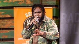 Emmitt James telling his story at the AfterDark: For the Culture StorySlam in 2023.