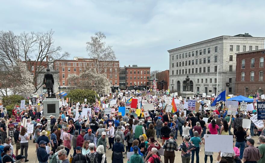 Hundreds of people peacefully gathered in Concord Saturday, April 19, 2025 to join groups in all fifty states protesting recent actions by the Trump Administration.