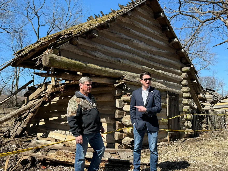 State Rep. Wayne Rosenthal, R-Morrisonville, and state Sen. Steve McClure, R-Springfield, show reporters around to deteriorating structures at Lincoln’s New Salem Historic Site in Petersburg on March 10, 2025. (Medill Illinois News Bureau photo by Athan Yanos)