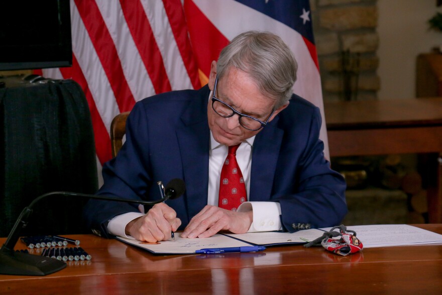 Gov. Mike DeWine signs SB263 into law on Jan. 6, 2021.