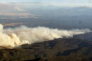 Heavy smoke rolls off of a wildfire burning in Central Oregon, July 27, 2026. As of Tuesday, large fires covered more than 1.1 million acres, according to the Oregon Department of Forestry.c