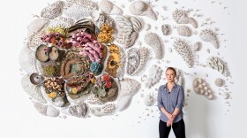 Mattison with “Our Changing Seas III,” depicting a swirl of coral morphing from bright to bleached, a sight playing out in real life across the world’s reefs