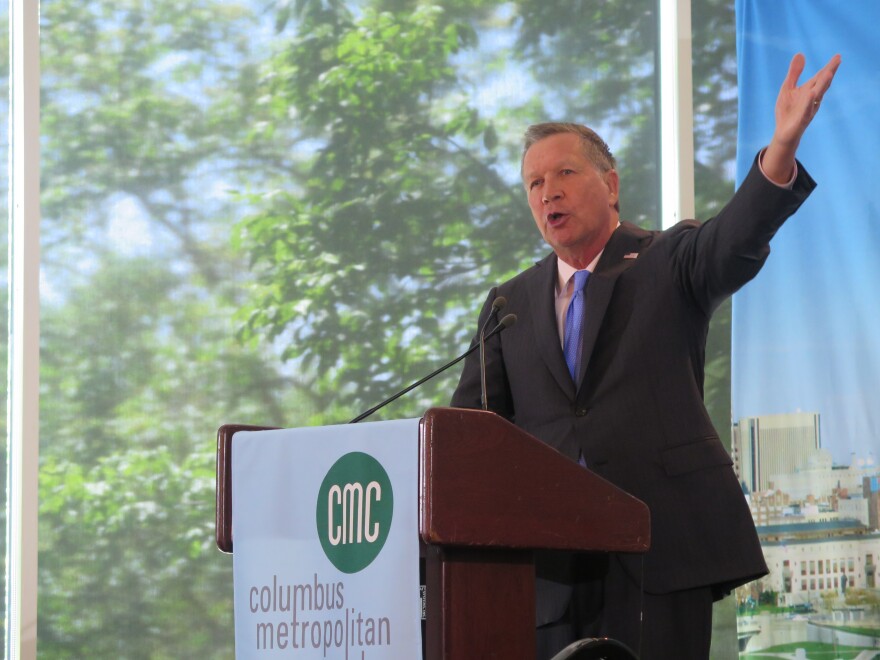 Gov. John Kasich gestures during a speech to the Columbus Metropolitan Club in May 2018.