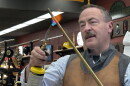 Pictured here is custom instrument maker George Schlub demonstrates the annealing process he uses in crafting his instruments.