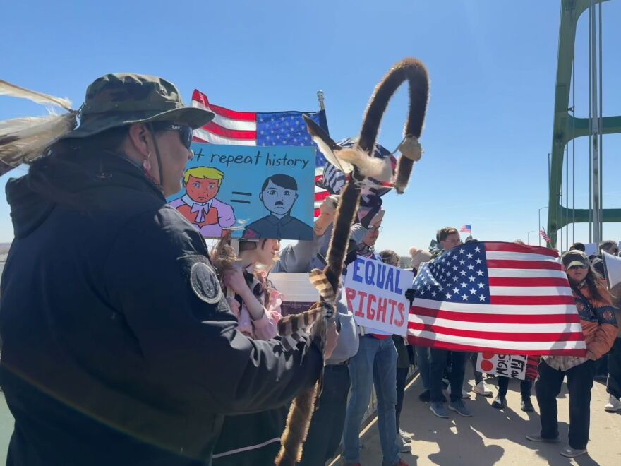 Manape LaMere attends a "No Kings" event in front of the Sioux City Public Museum on March 28, 2026. He previously protested against the Dakota Access Pipeline in North Dakota.