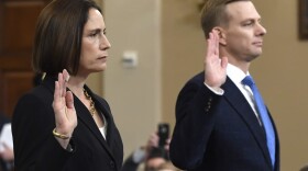 Former White House national security aide Fiona Hill, and David Holmes, a U.S. diplomat in Ukraine, are sworn in to testify before the House Intelligence Committee on Capitol Hill in Washington, Thursday, Nov. 21, 2019, during a public impeachment hearing of President Donald Trump's efforts to tie U.S. aid for Ukraine to investigations of his political opponents.(Susan Walsh/AP)