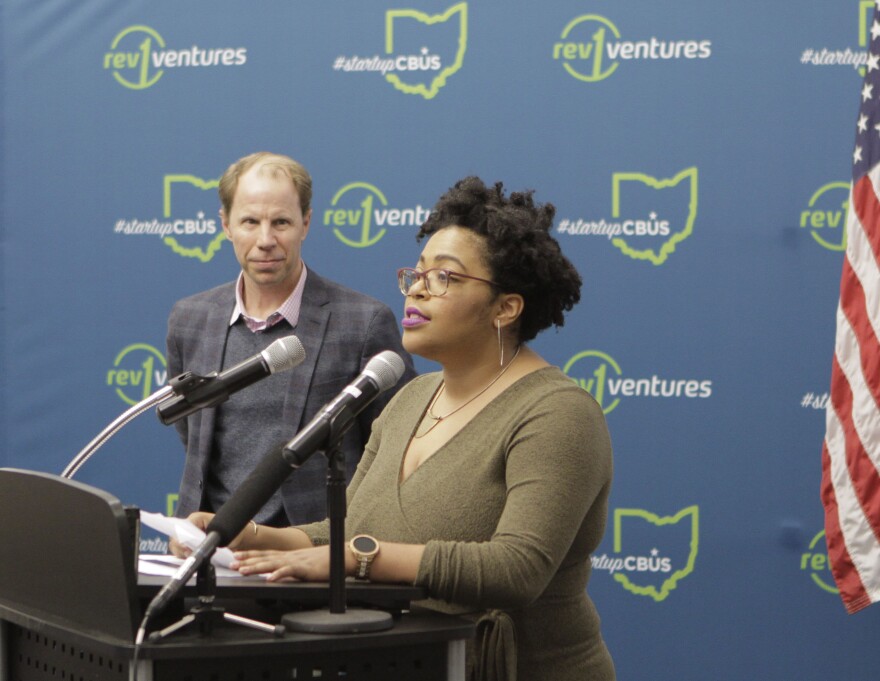 Forward Cities Local Director L.C. Johnson speaking next to the organization's CEO Christopher Gergen.