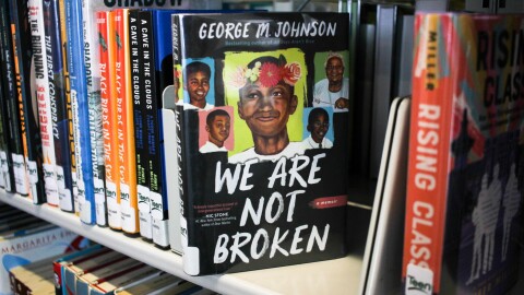 George Johnson's "We Are Not Broken," is shown on a shelf in the teen section of the main library of the Columbus Metropolitan Library. Another of Johnson's books "All Boys Aren't Blue" is often challenged for its LGBTQ content, profanity and depictions of sex.