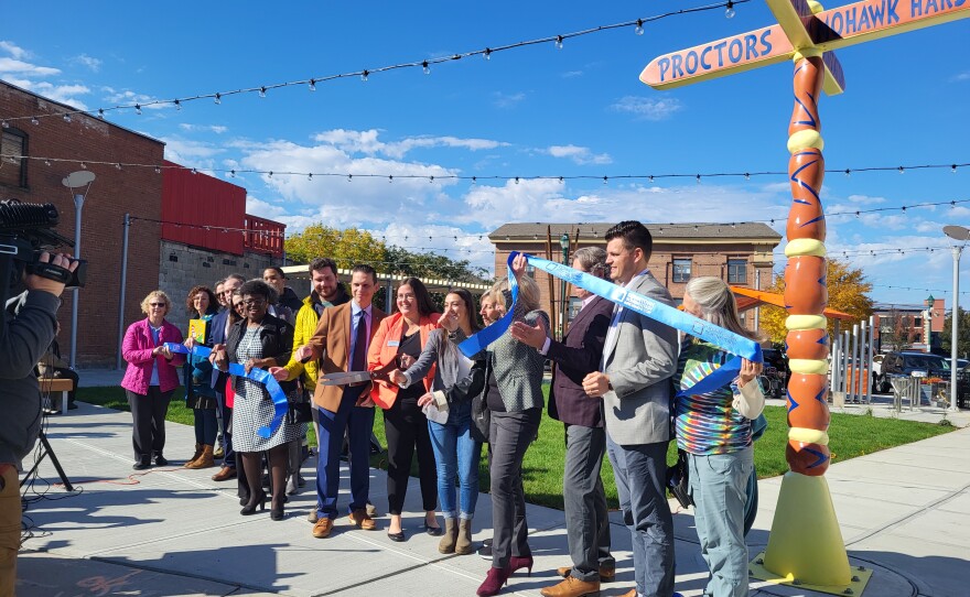 New York Assemblyman Angelo Santabarbara cuts the ribbon on Jay Square in Schenectady on October 24, 2023.