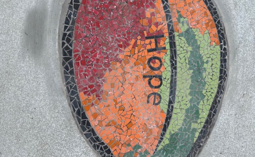 The new Ruskin Commons features a colorful mosaic of leaves spelling the word ‘HOPE’ in eight languages. This plaza is opposite Ruskin Elementary School.